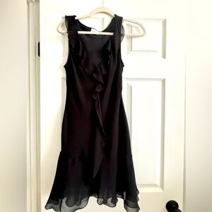 Aritzia little black dress with bottom ruffle, size medium. NEVER USED!